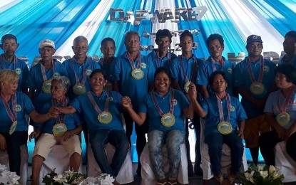 <p>Members of Dama Farm Workers Agrarian Reform Beneficiaries Association based in Barangay Cabacungan in La Castellana, Negros Occidental celebrate their 15th anniversary on Monday. <em>(Photo by Erwin P. Nicavera)</em></p>